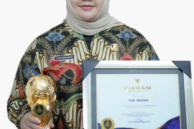 99,20 Persen Warga Terdaftar JKN , Pemkab Sragen Terima UHC Award